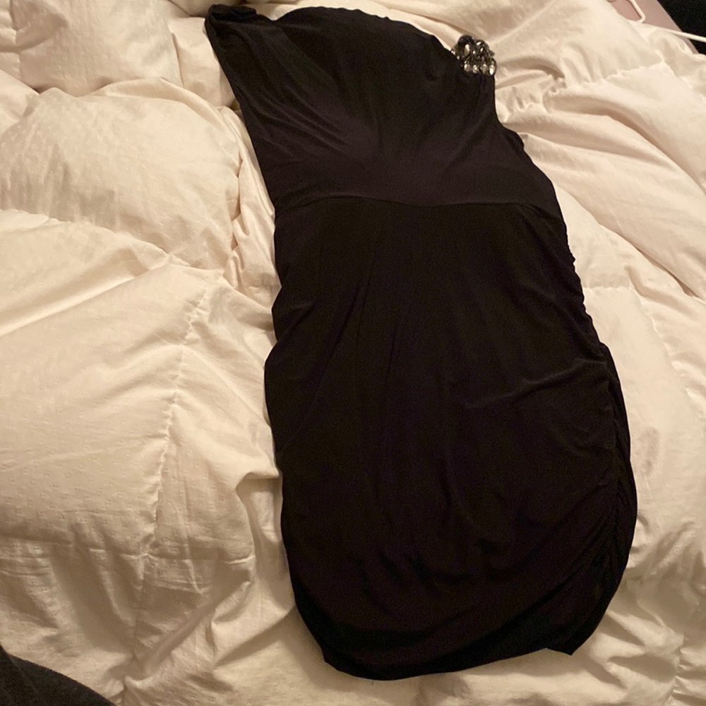 Black, knee length cocktail dress. Size 1X, machine washable, never worn